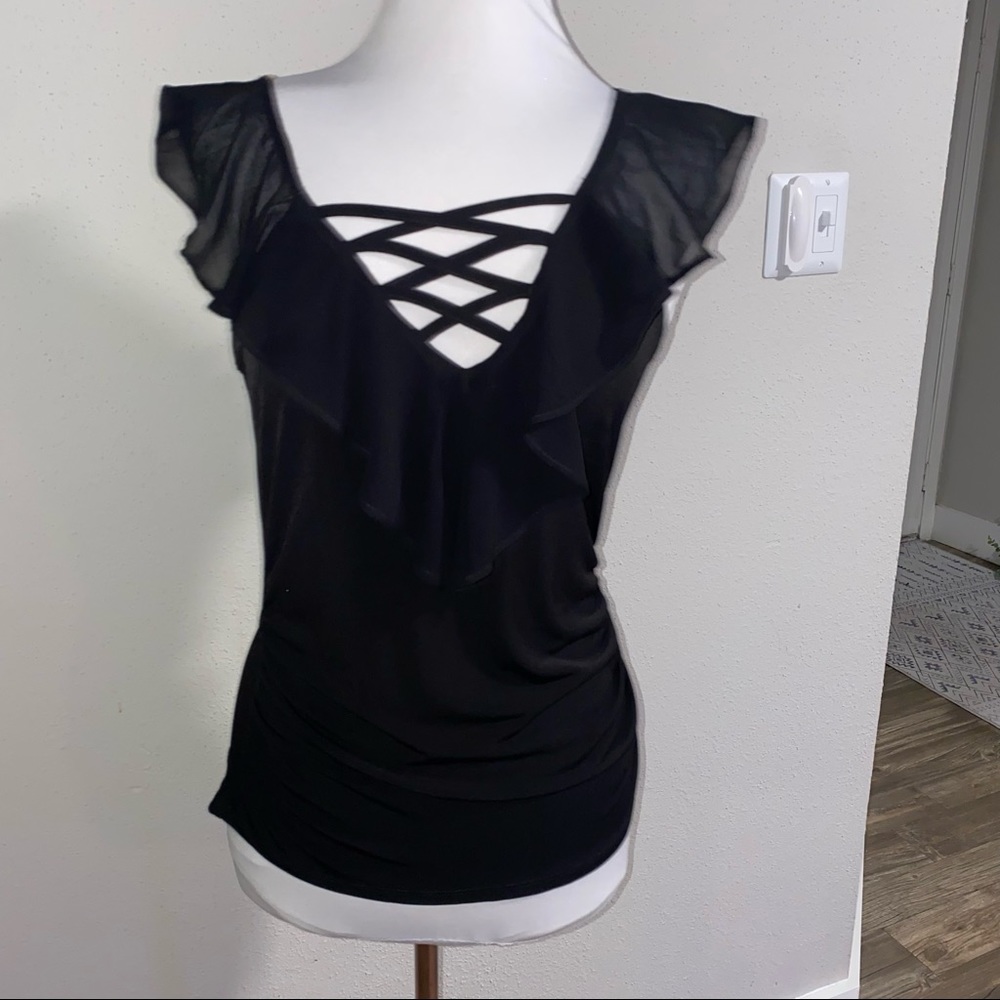 Black sheer blouse with ruffle and cage chest